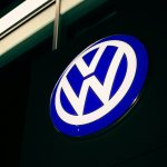 Volkswagen Group headquarters Wolfsburg with cybersecurity data breach overlay