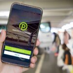 ParkMobile app open on a smartphone displaying digital parking ticket after data breach settlement